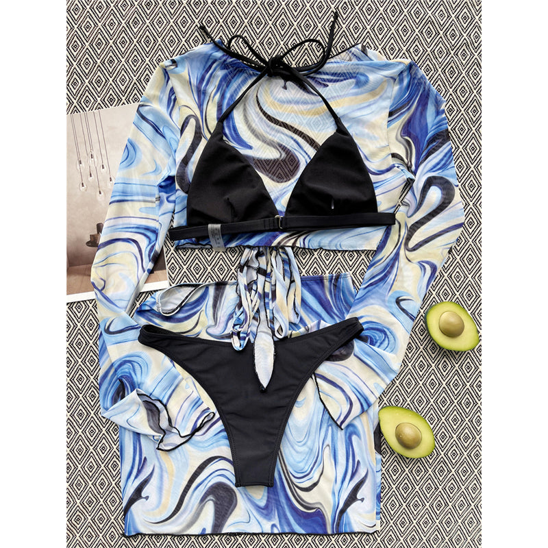 Explore the trendiest beach look with the Four Piece Bikinis Swimsuit featuring a long-sleeve top and a fashionable mesh skirt. Perfect for a day of sun and surf. Available at Apparel Base.