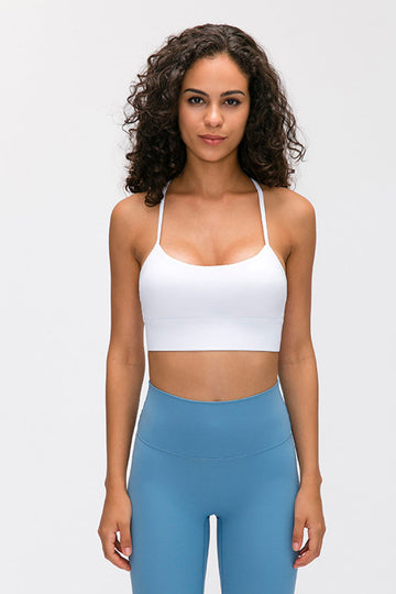 Experience comfort and style with our Y-Back Yoga Bra Tops. These wireless bras with removable padding and a spaghetti strap neckline offer a tight fit for your active lifestyle. Crafted from 80% nylon and 20% spandex, they provide flexibility and are machine washable. Perfect for yoga and fitness wear.