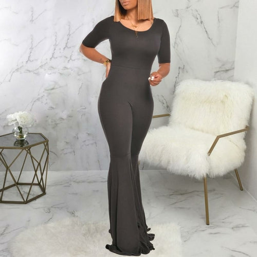 Indulge in elegance with our Women Flare Jumpsuit - a perfect blend of style and comfort. Featuring solid flare pants, this bodycon romper offers a flattering fit with a high waist design. 