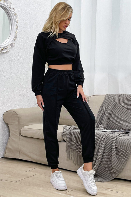 Stay stylish and comfortable in our trendy Cut Out Crop Top and Joggers Set. Perfect for a relaxed fit, this lounge wear is a must-have in your wardrobe. Available in the United States.