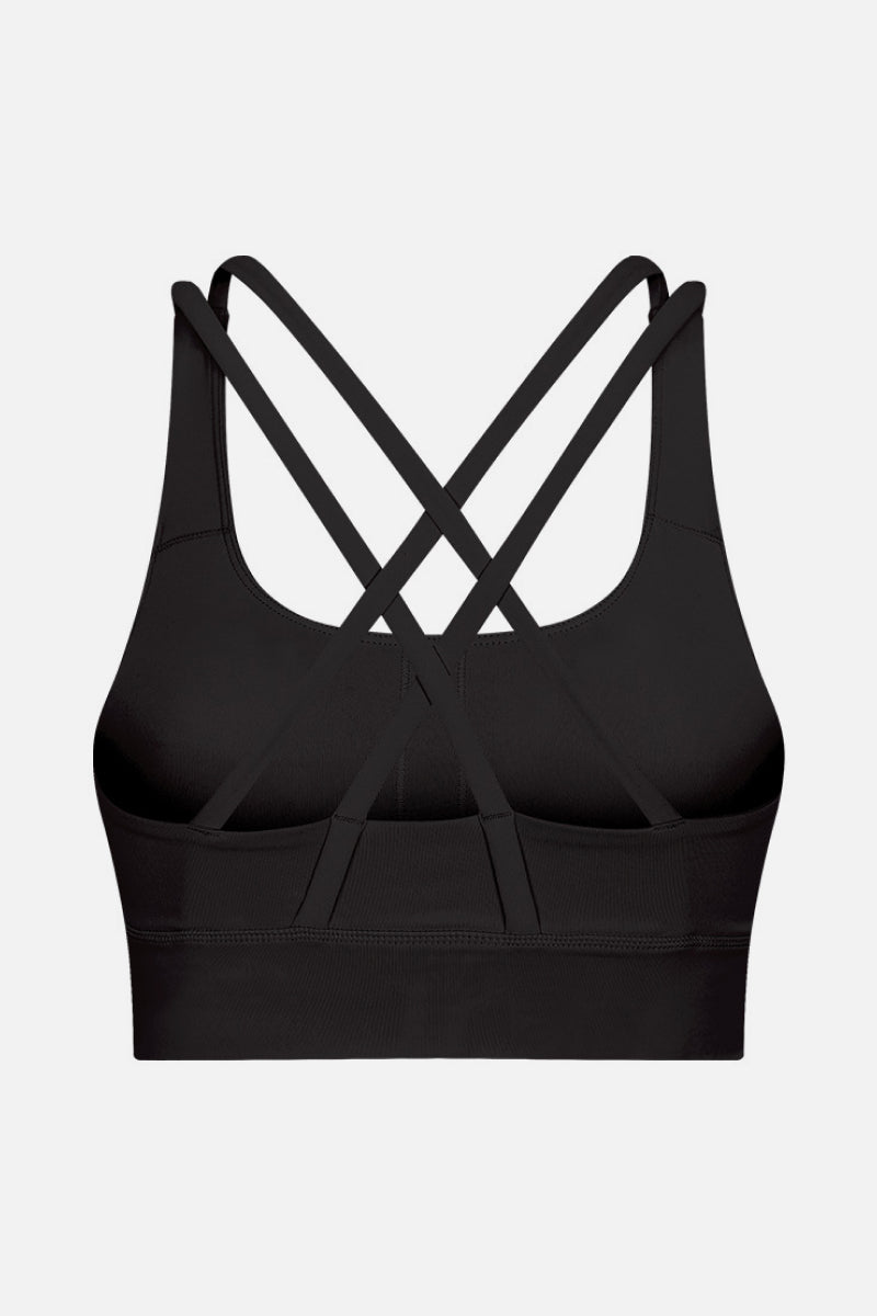 Double X Sports Bra in basic colors - Seamless design with an eye-catching double X strappy back for ultimate style and support. Crafted from 87% nylon and 13% spandex. True to size, machine washable, and perfect for elevating your workout wardrobe. Available from Apparel Base for the active and stylish woman.