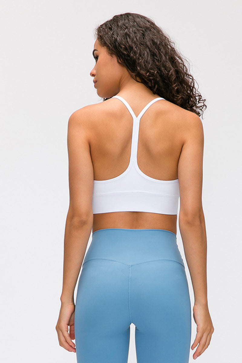 Experience comfort and style with our Y-Back Yoga Bra Tops. These wireless bras with removable padding and a spaghetti strap neckline offer a tight fit for your active lifestyle. Crafted from 80% nylon and 20% spandex, they provide flexibility and are machine washable. Perfect for yoga and fitness wear.