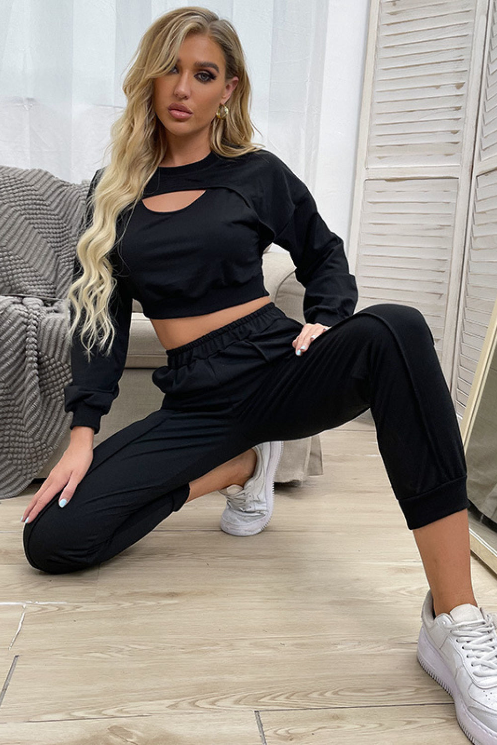 Stay stylish and comfortable in our trendy Cut Out Crop Top and Joggers Set. Perfect for a relaxed fit, this lounge wear is a must-have in your wardrobe. Available in the United States.