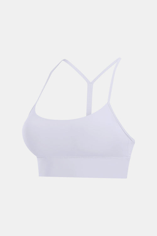 Experience comfort and style with our Y-Back Yoga Bra Tops. These wireless bras with removable padding and a spaghetti strap neckline offer a tight fit for your active lifestyle. Crafted from 80% nylon and 20% spandex, they provide flexibility and are machine washable. Perfect for yoga and fitness wear.