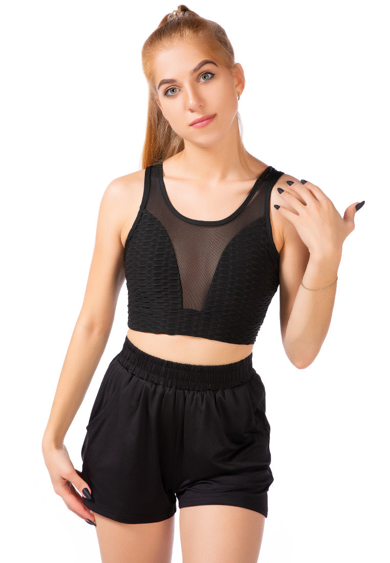 Active Sports Mesh Bra with textured knit fabric and sheer panels. Ample support and stylish design. Skinny fit, scoop neck, and stretchable for comfort. Ideal for workouts and athleisure. Model wears US S / UK 6. Shop now for the perfect fitness fashion - CLG8350.