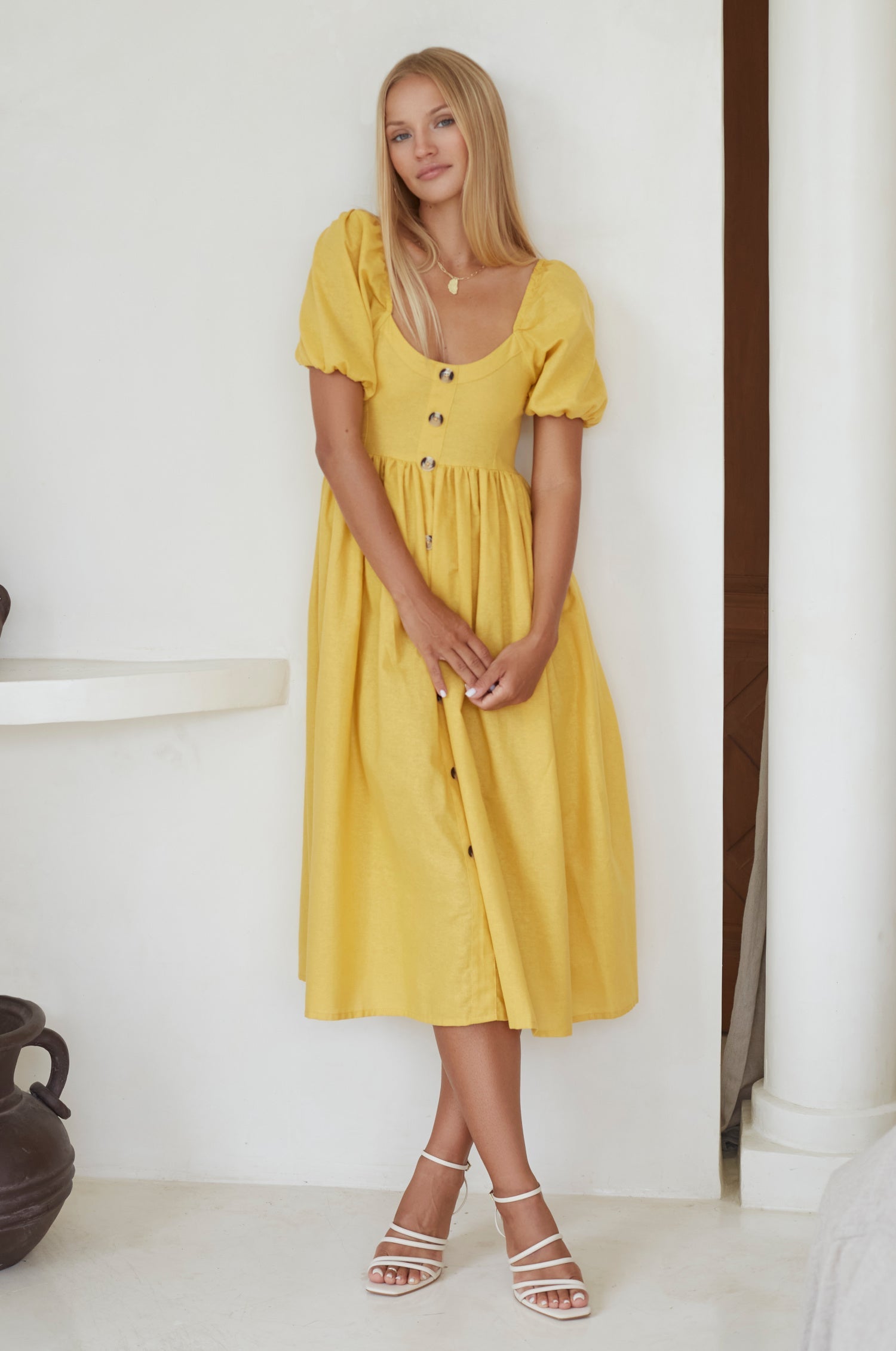 Experience effortless elegance with our Adele Midi Dress, crafted from pure linen for drape and lightness. 