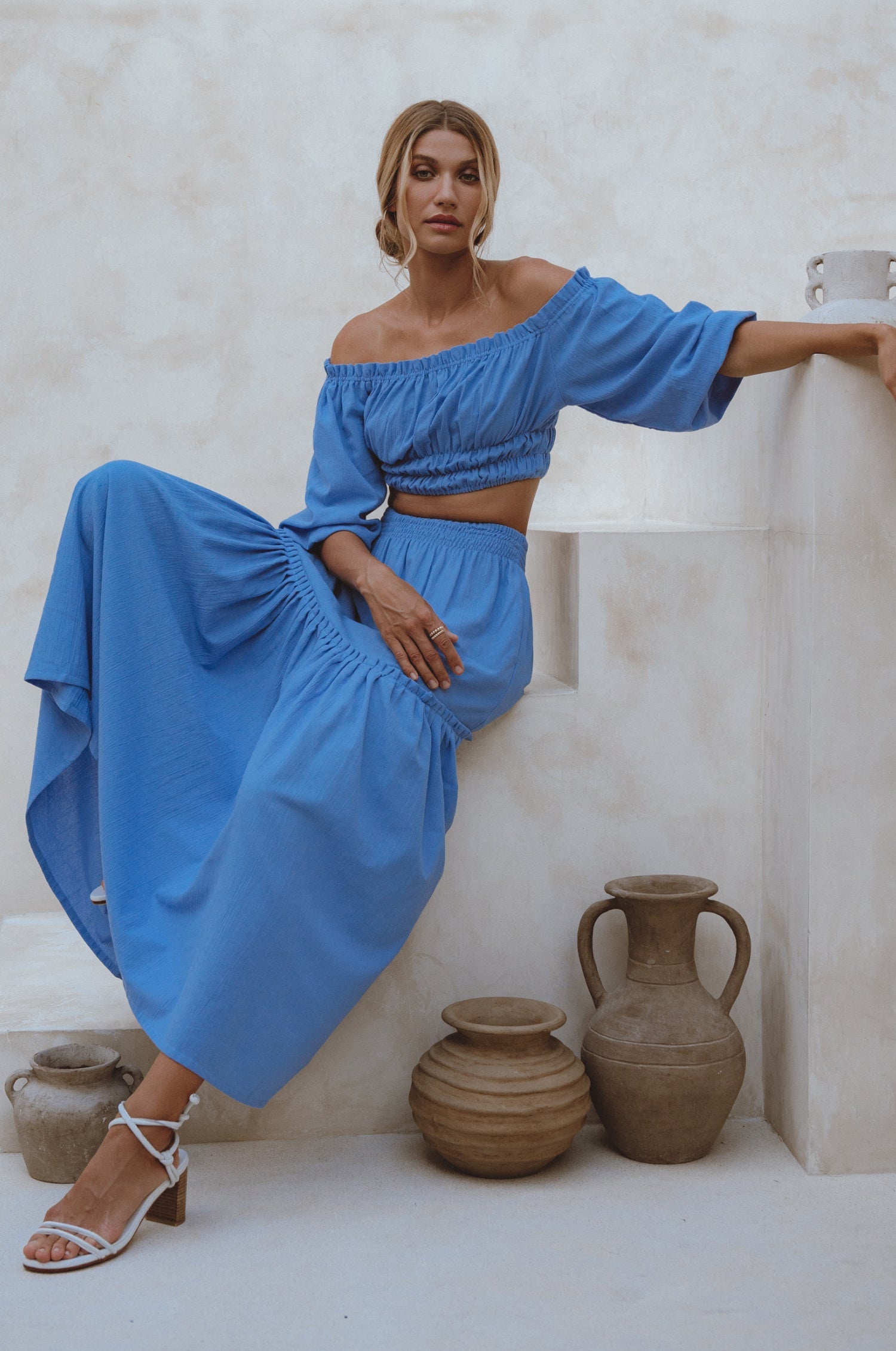 Explore the Annabelle Linen Cropped Top, a must-have in your wardrobe. Handcrafted from high-quality linen, it offers comfort and style. Pair with the matching maxi skirt or your favorite denim for a chic look.