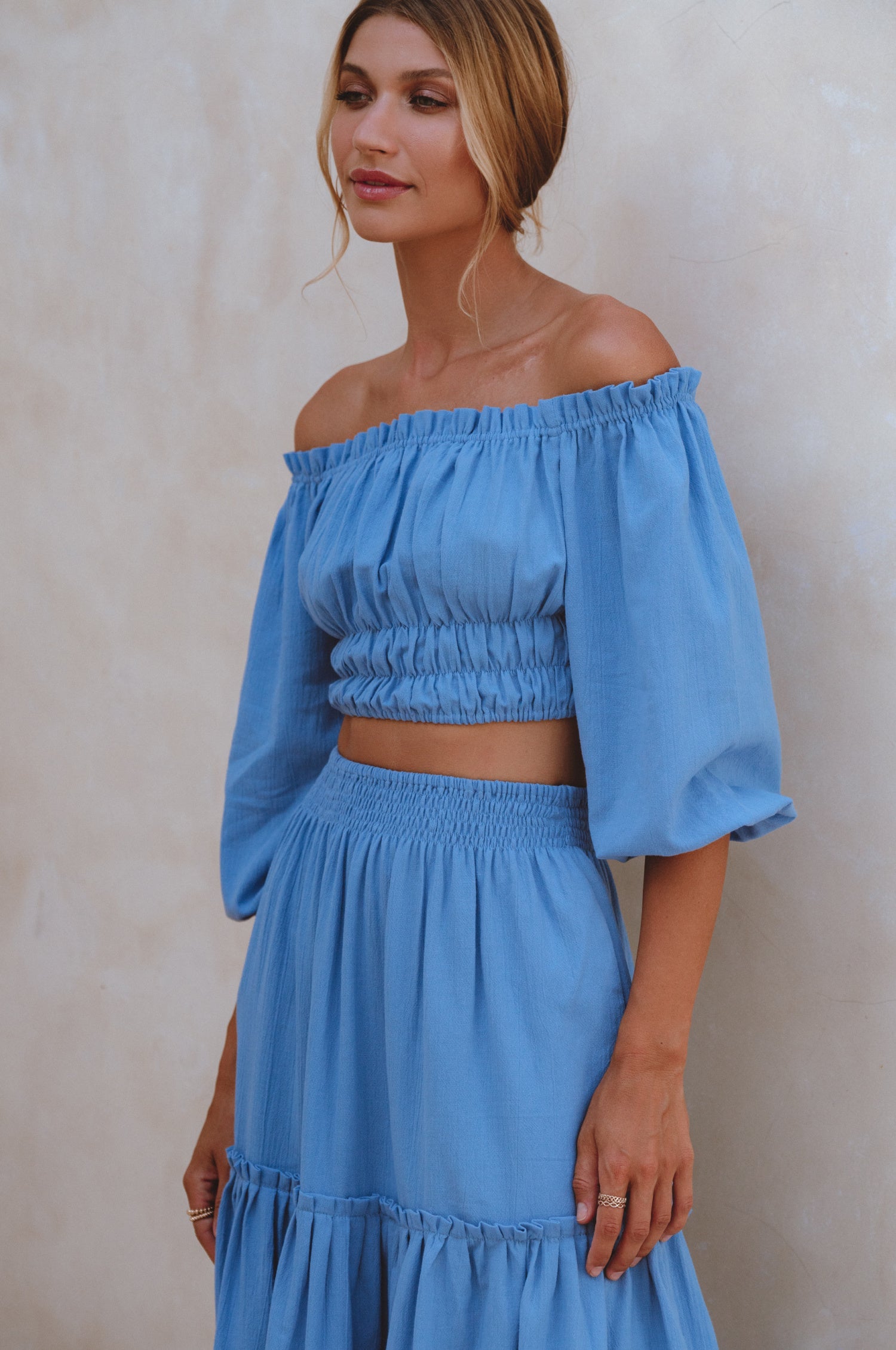 Explore the Annabelle Linen Cropped Top, a must-have in your wardrobe. Handcrafted from high-quality linen, it offers comfort and style. Pair with the matching maxi skirt or your favorite denim for a chic look.