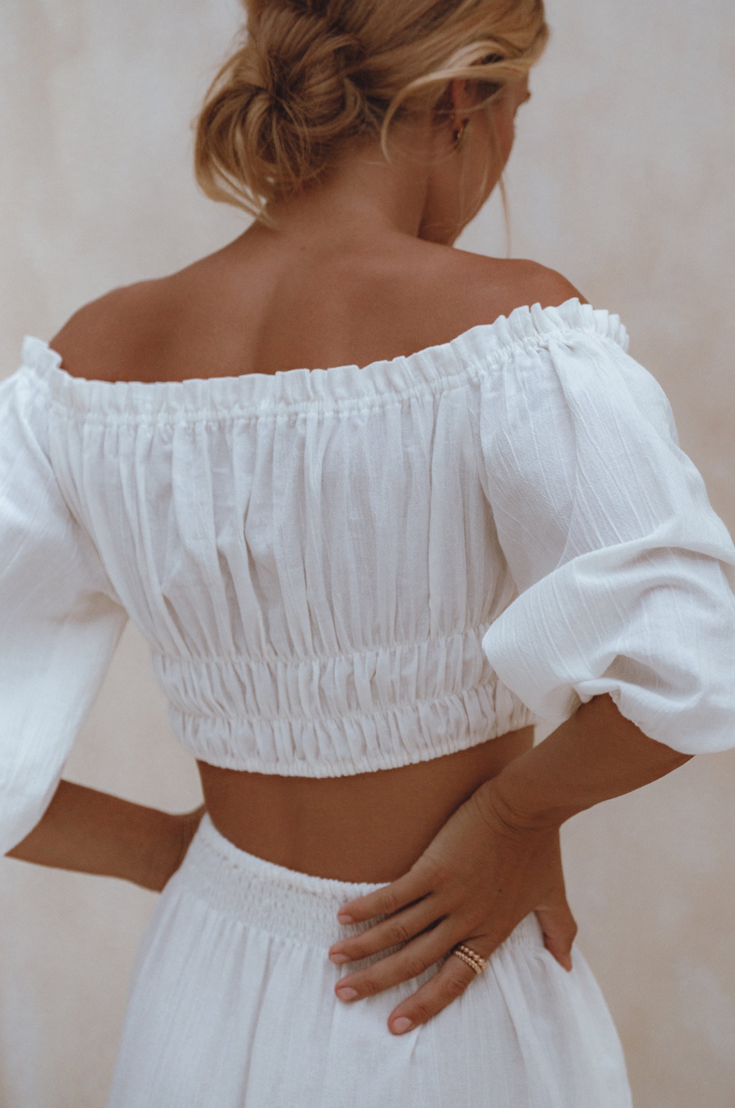 Explore the Annabelle Linen Cropped Top, a must-have in your wardrobe. Handcrafted from high-quality linen, it offers comfort and style. Pair with the matching maxi skirt or your favorite denim for a chic look.