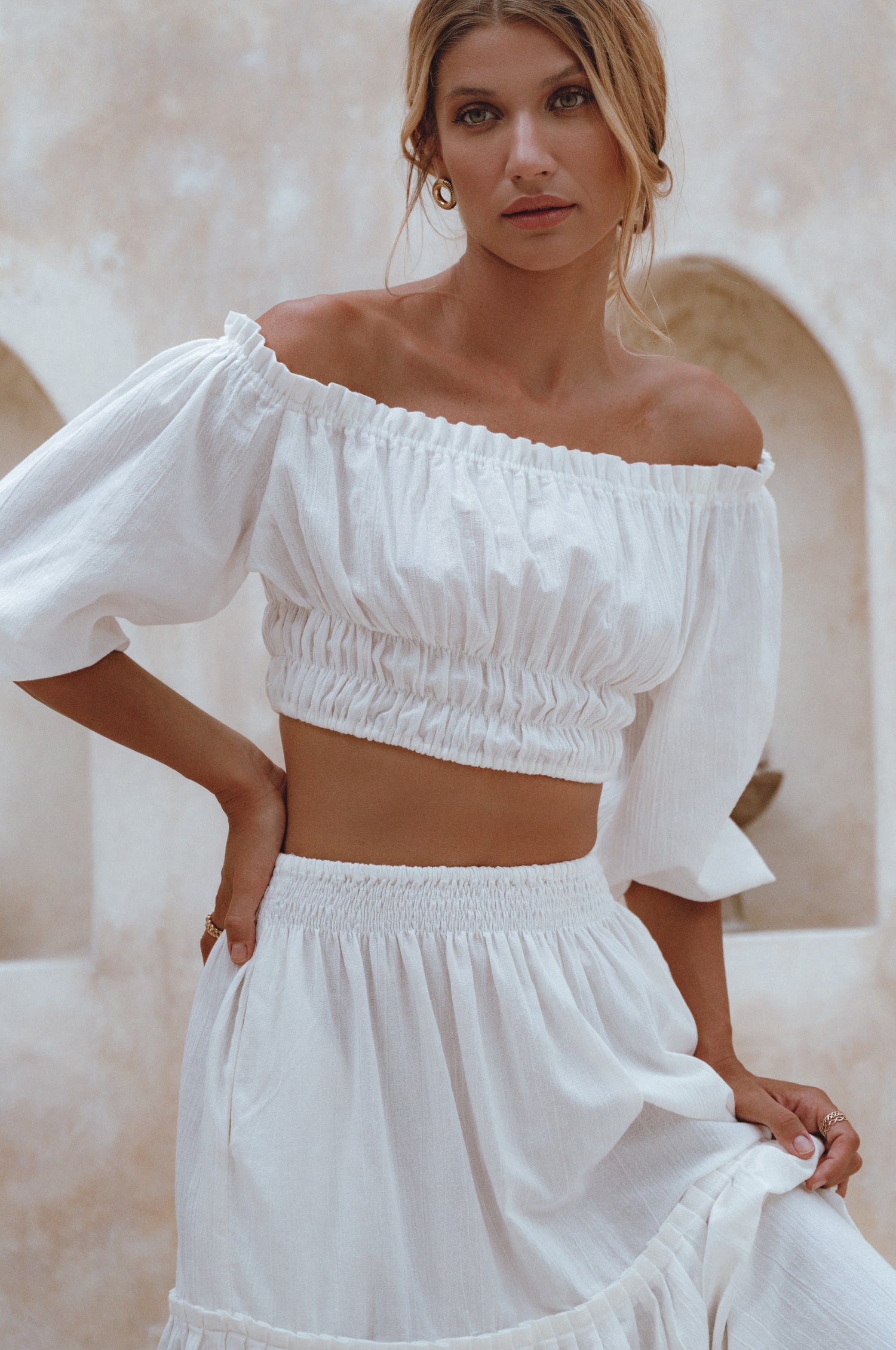 Explore the Annabelle Linen Cropped Top, a must-have in your wardrobe. Handcrafted from high-quality linen, it offers comfort and style. Pair with the matching maxi skirt or your favorite denim for a chic look.