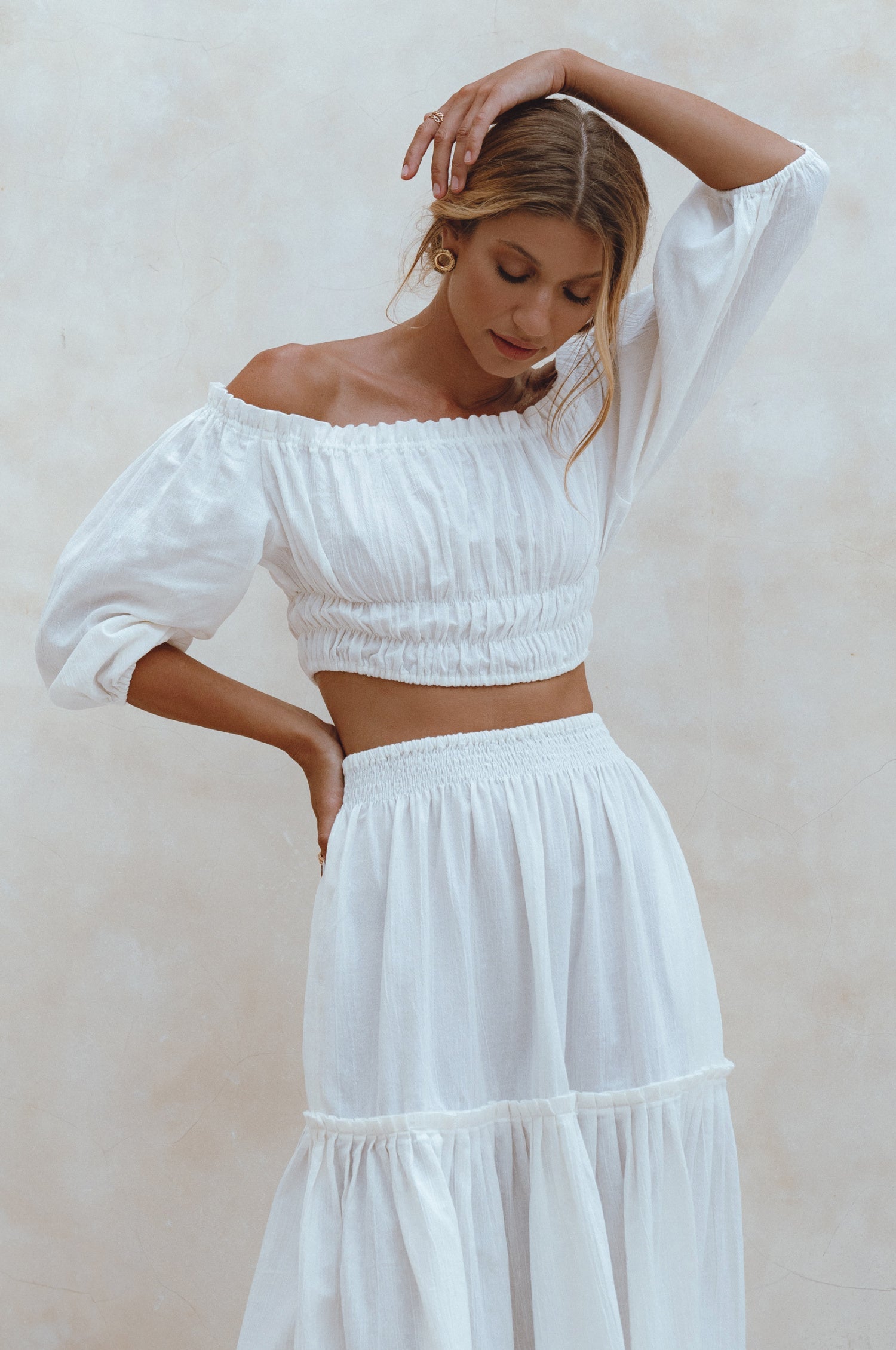 Explore the Annabelle Linen Cropped Top, a must-have in your wardrobe. Handcrafted from high-quality linen, it offers comfort and style. Pair with the matching maxi skirt or your favorite denim for a chic look.