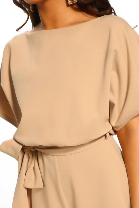 Stay on-trend with our Apricot Short Sleeve Playsuit. Comfortable and stylish, featuring a detachable belt and chic details. Ideal for a casual yet fashionable summer look. Available in sizes S to XL.