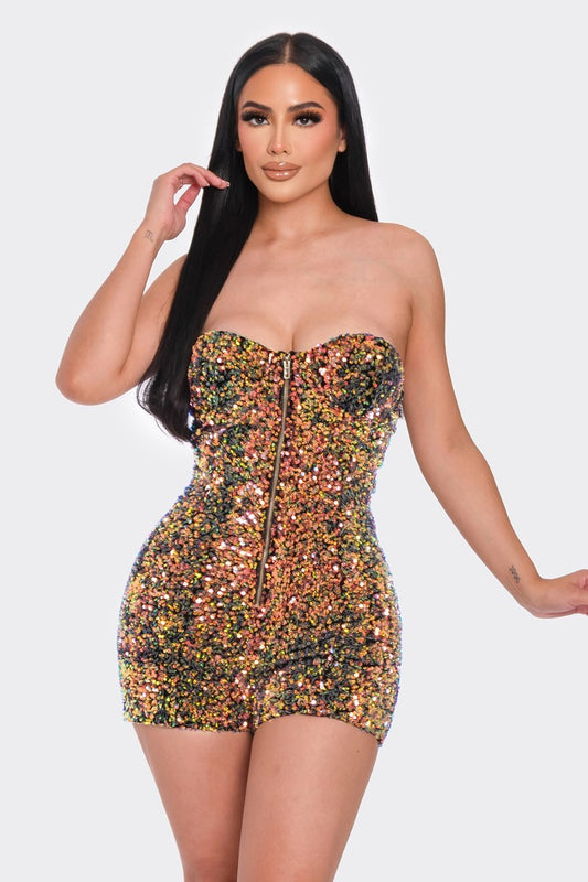 Strut your style in the Gold Green Sequins Tube Top Romper. Perfect for a night out. Available in the United States.