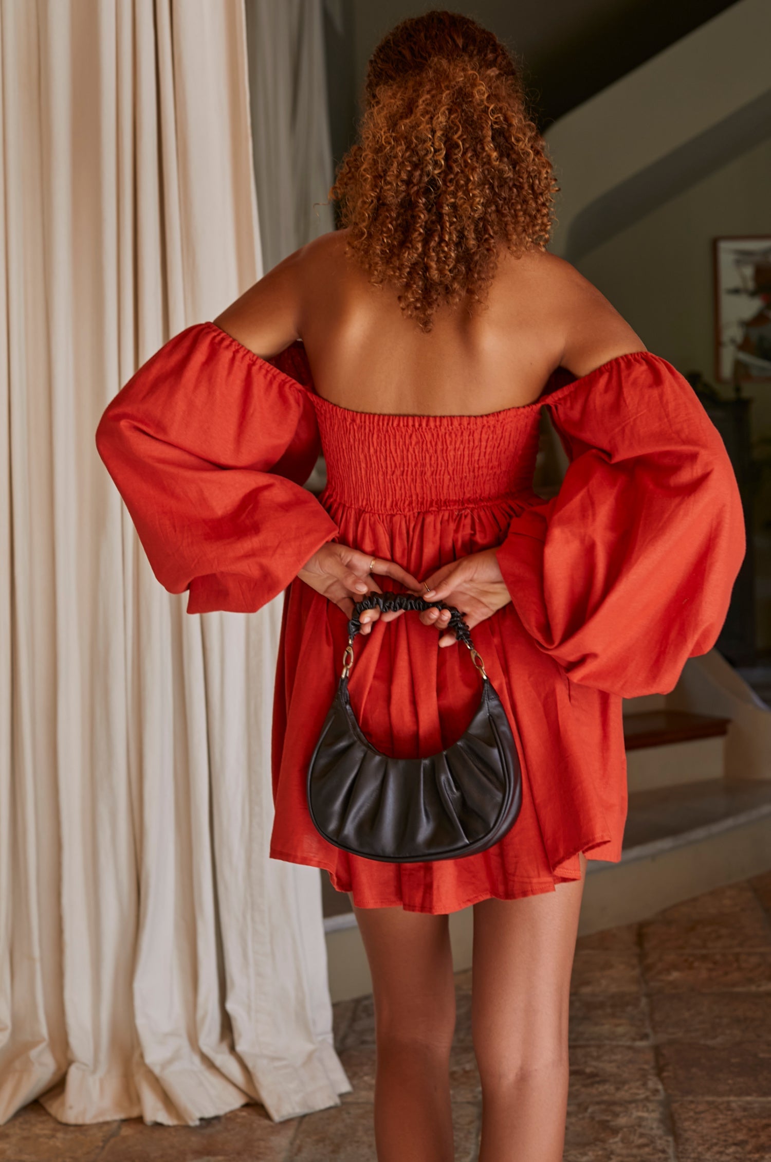 Experience effortless charm with the Chloie Empire Waist Linen Mini Dress. Designed with gorgeous long puff sleeves, a smocked square shape back, and elasticated sleeves, this easy-to-wear dress is perfect for any occasion. 