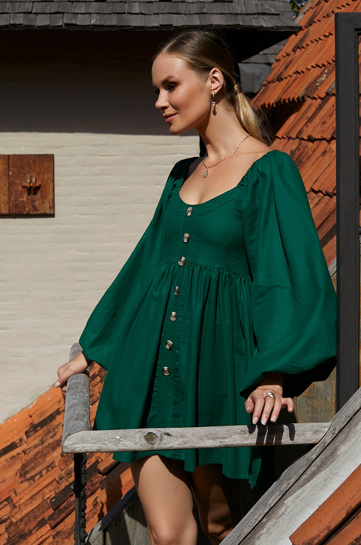 Experience effortless charm with the Chloie Empire Waist Linen Mini Dress. Designed with gorgeous long puff sleeves, a smocked square shape back, and elasticated sleeves, this easy-to-wear dress is perfect for any occasion. 