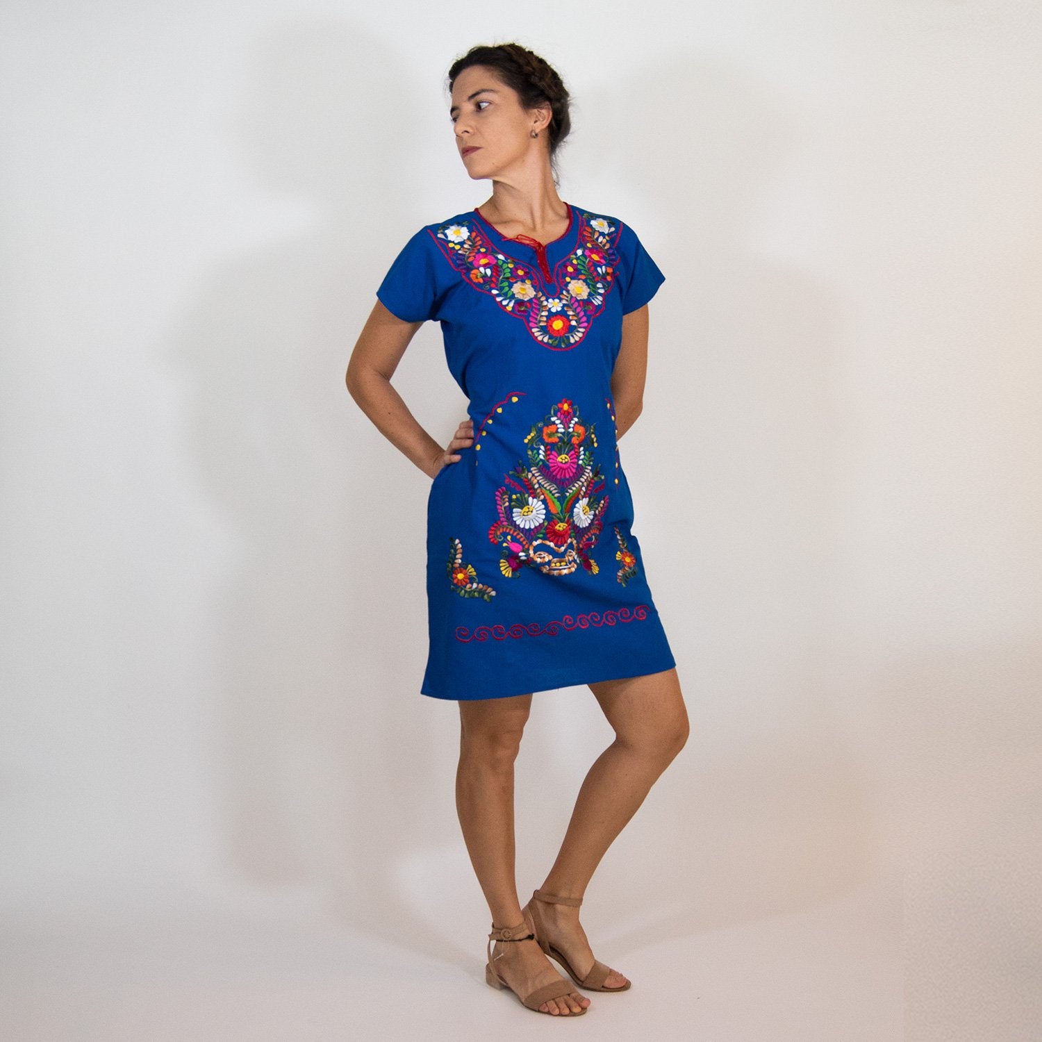 Embrace culture in our Southwestern Blue Colorful Dress. Handcrafted with love, this versatile cotton dress features intricate embroidery from San Gabriel Chilac, Mexico.