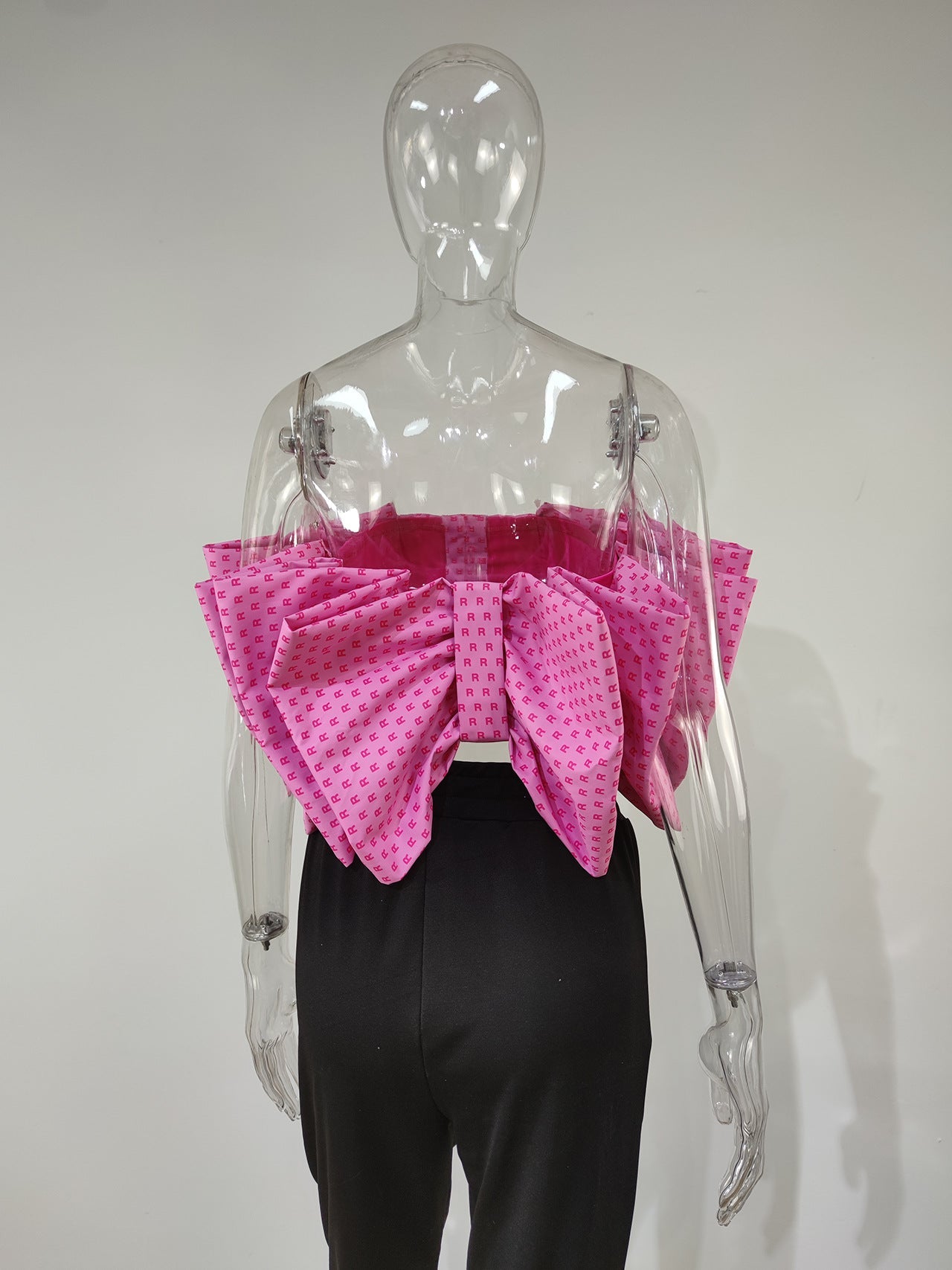 Stay on trend with Women Butterfly Crop Tops, showcasing sleeveless style and a chic bow collar. Perfect for fashionable moments in the United States.