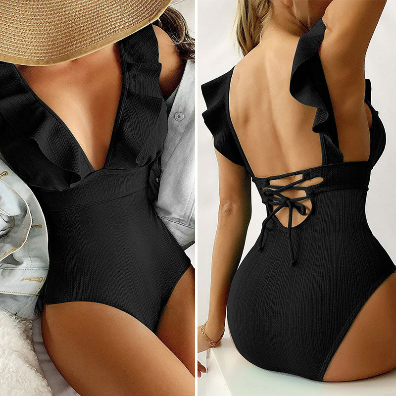 Stand out on the beach with the elegant Ruffle Swimsuit in timeless black. This vintage-inspired bikini set with a back string and high waist is available at Apparel Base for your chic swimwear collection.