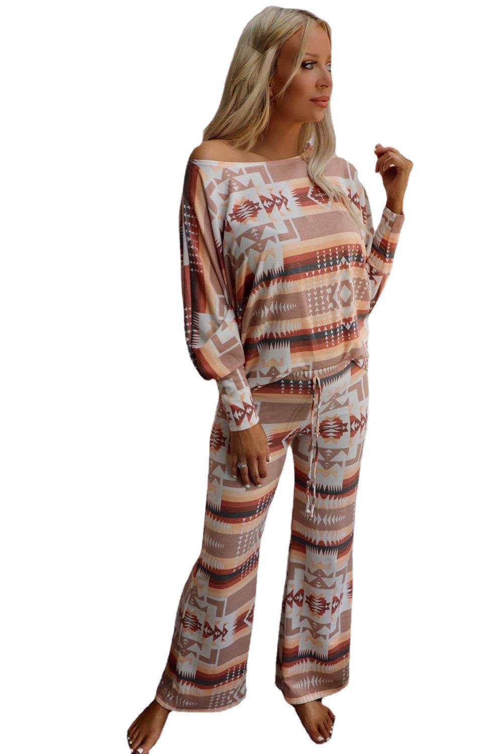 Embrace comfort and style with our Diamond Print Home Wear. This ensemble, designed for women, features a trendy diamond pattern. The long sleeve top and matching long pants are perfect for staying cozy during the fall and winter seasons.