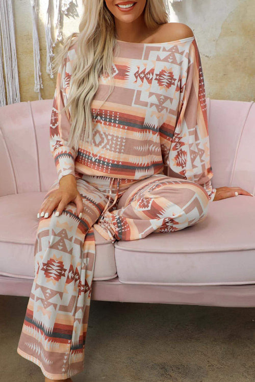 Embrace comfort and style with our Diamond Print Home Wear. This ensemble, designed for women, features a trendy diamond pattern. The long sleeve top and matching long pants are perfect for staying cozy during the fall and winter seasons.