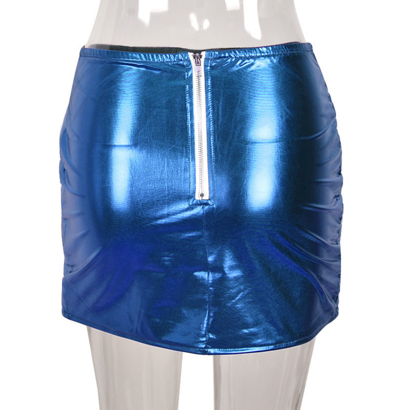 Blue Metallic Puffer Skirt - Elevate your style with this trendy A-line mini. Crafted from soft and breathable 100% Polyester, it provides a warm and flattering fit. Perfect for daily wear, parties, and nights out. Available in sizes S, M, and L. Zip up the style with our metallic shiny quilted skirt