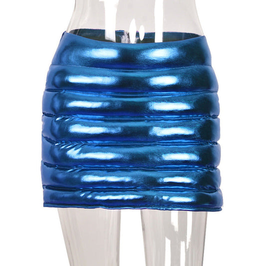 Blue Metallic Puffer Skirt - Elevate your style with this trendy A-line mini. Crafted from soft and breathable 100% Polyester, it provides a warm and flattering fit. Perfect for daily wear, parties, and nights out. Available in sizes S, M, and L. Zip up the style with our metallic shiny quilted skirt