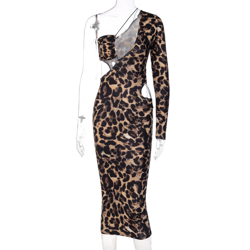 Capture attention in our Sexy Bandage Cut Out Leopard Print Midi Dress. The sheath silhouette, V-neckline, and ankle-length design create a bold and stylish look. 