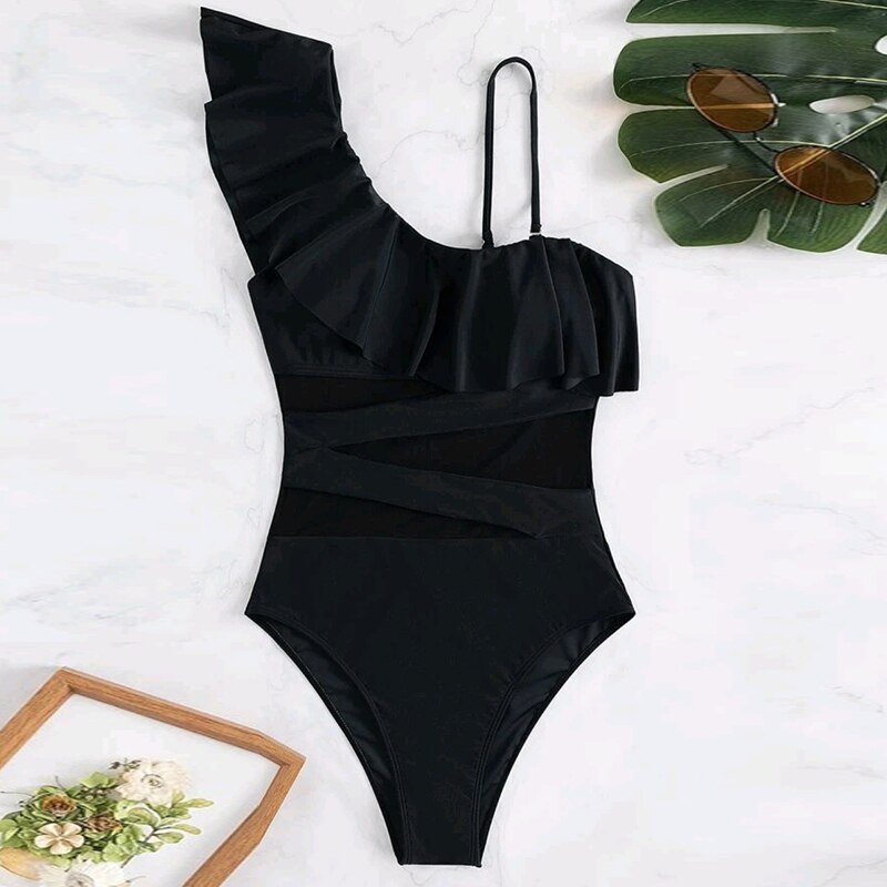 Stand out in style with the Summer Sexy Ruffle Mesh One-Piece Swimsuit. Trendy and unique, this swimsuit offers a flattering fit, accentuating your curves with high-quality comfort. Perfect for beach days and poolside fashion in the United States.