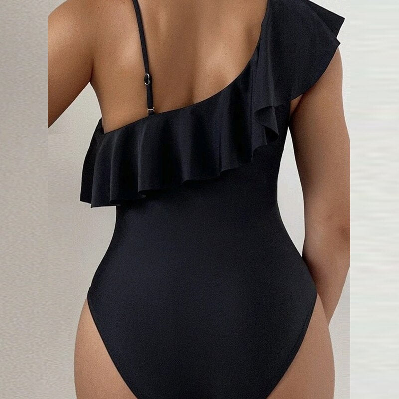 Stand out in style with the Summer Sexy Ruffle Mesh One-Piece Swimsuit. Trendy and unique, this swimsuit offers a flattering fit, accentuating your curves with high-quality comfort. Perfect for beach days and poolside fashion in the United States.