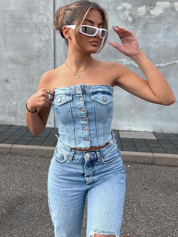 Explore fashion-forward looks with our Button-up Denim Corset Crop Top. Trendy denim, flattering corset design, and sophisticated button-up front. Ideal length for pairing with high-waisted bottoms. Perfect for stylish women in the United States.