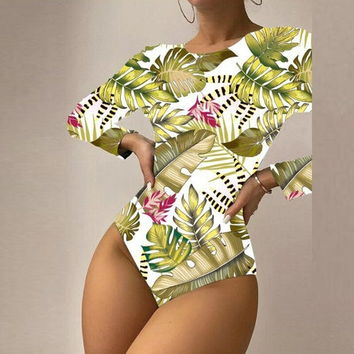 Elevate your beach look with our Leaf Print Cross Backless One-Piece Swimsuit. Ideal for women in the United States, this trendy swimwear in various sizes ensures a perfect fit. Enjoy comfort and style with the leaf print, wire-free support, and mid-waist design.