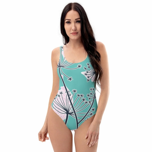 Embrace your curves in the Kai One-Piece Swimsuit. This flattering swimwear from Apparel Base offers a sleek and stylish look for beach or pool outings.