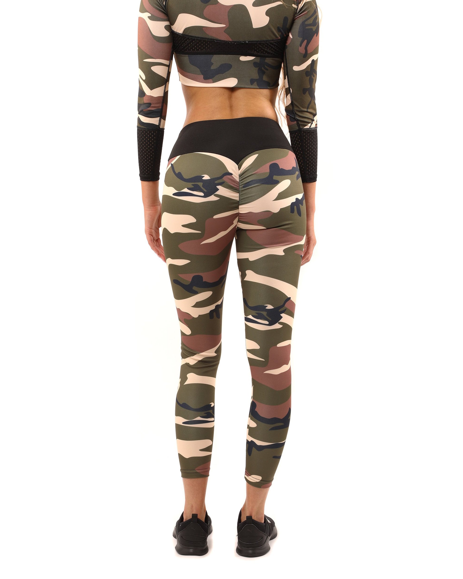 Elevate your workout wardrobe with the Virginia Camouflage Leggings in brown and green by Apparel Base. These stylish leggings offer a form-fitting compression, ideal for indoor and outdoor workouts. Made from high-quality materials, they provide a sculpted fit and premium design. Perfect for athleisure wear and challenging workouts, these leggings are a must-have for your fitness fashion collection.