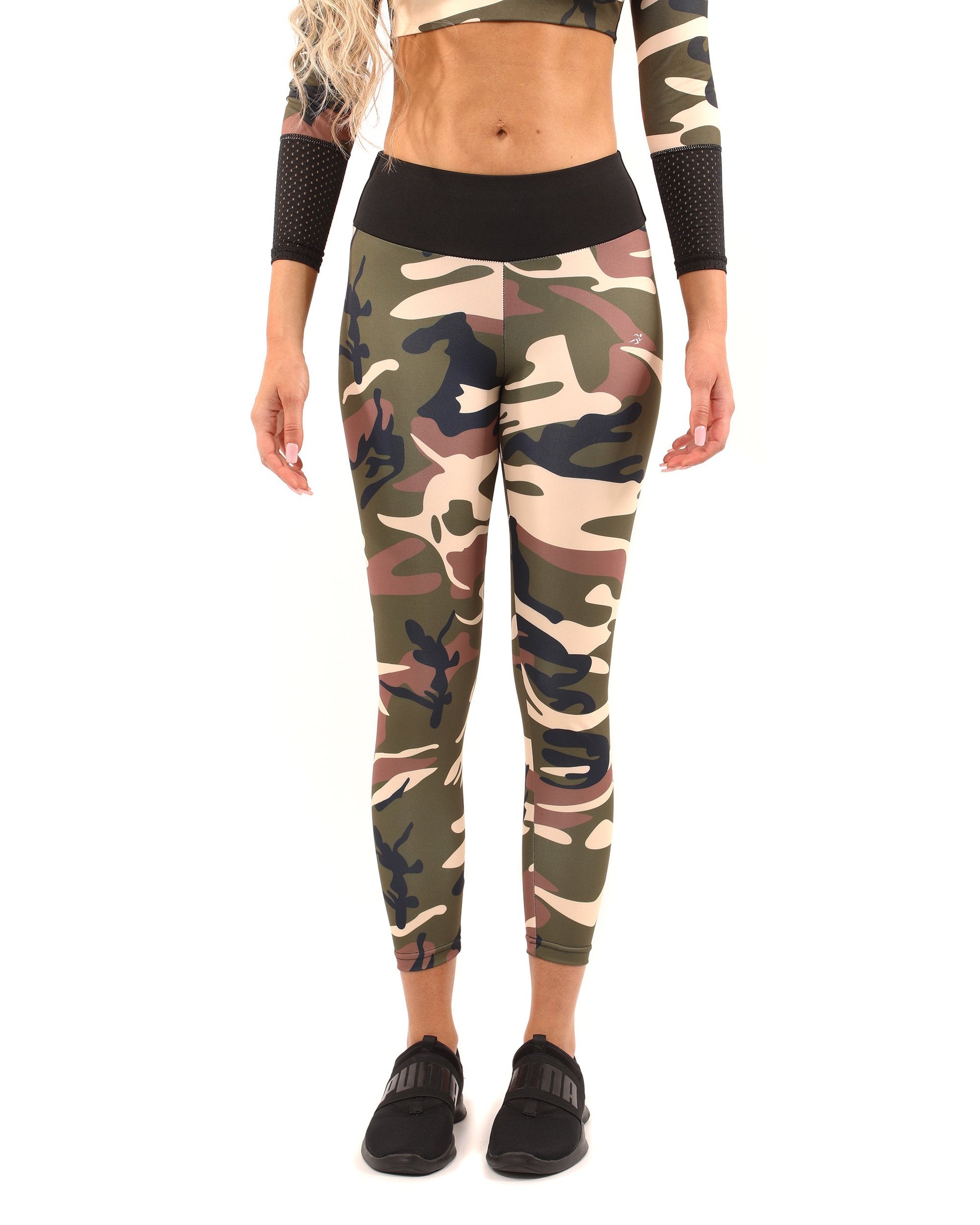 Elevate your workout wardrobe with the Virginia Camouflage Leggings in brown and green by Apparel Base. These stylish leggings offer a form-fitting compression, ideal for indoor and outdoor workouts. Made from high-quality materials, they provide a sculpted fit and premium design. Perfect for athleisure wear and challenging workouts, these leggings are a must-have for your fitness fashion collection.