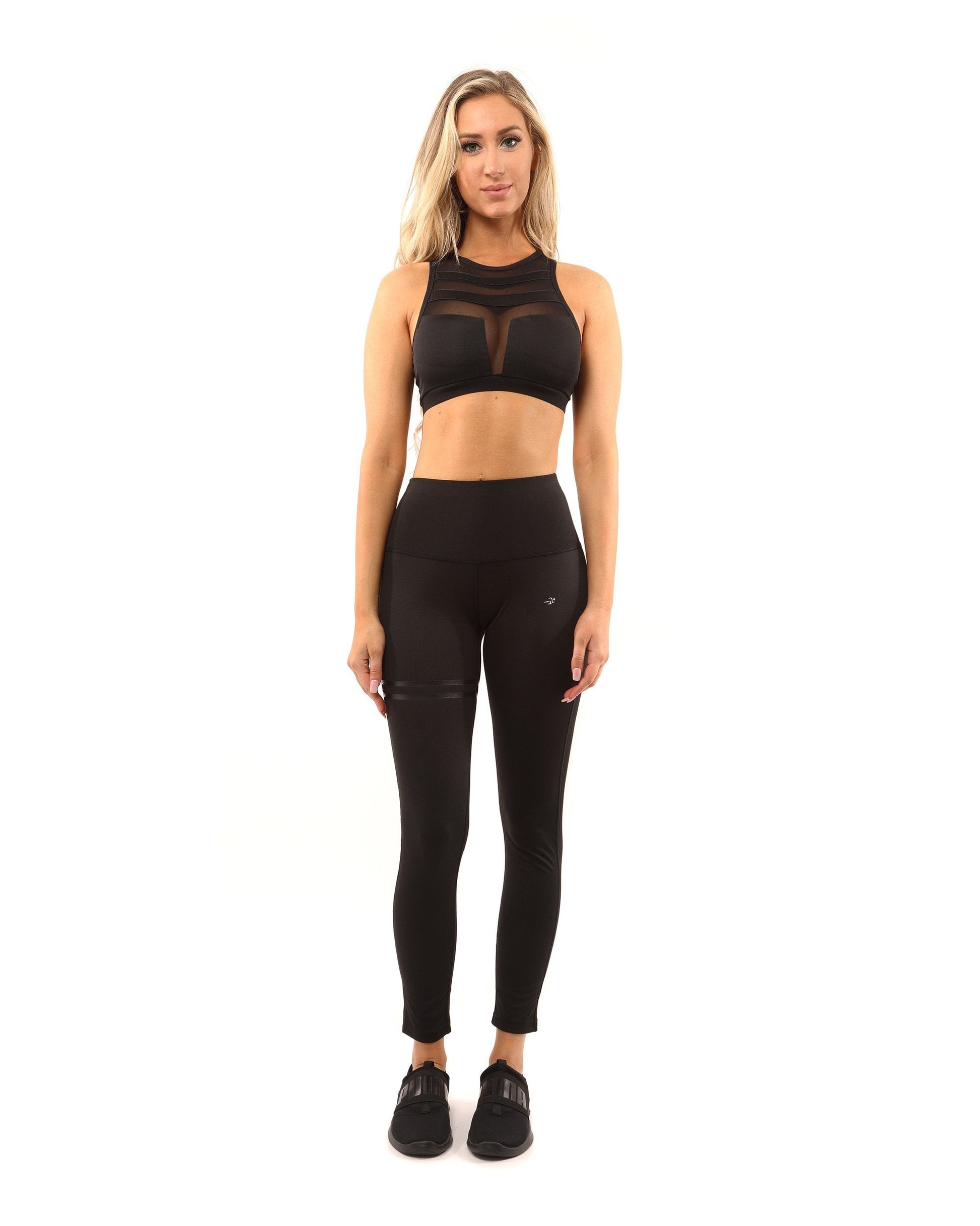 Laguna Sports Bra in Black by Savoy Active. Stylish and supportive workout bra with a compression fit. Racerback design for full mobility. High-quality fabric for a cool and dry feel. Perfect for layering or wearing on its own. Luxury styling with exquisite stitching. Ideal for the gym and daily activities.