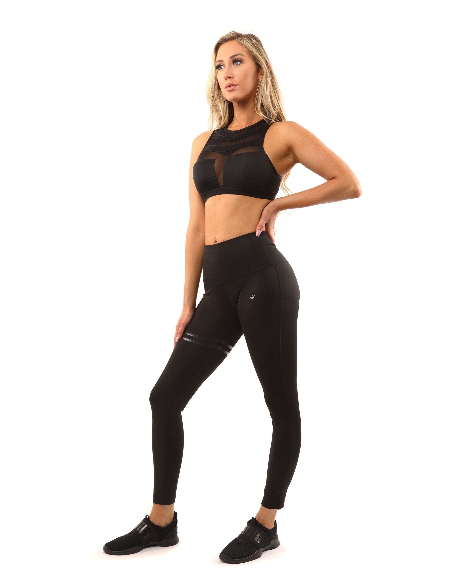 Laguna Sports Bra in Black by Savoy Active. Stylish and supportive workout bra with a compression fit. Racerback design for full mobility. High-quality fabric for a cool and dry feel. Perfect for layering or wearing on its own. Luxury styling with exquisite stitching. Ideal for the gym and daily activities.