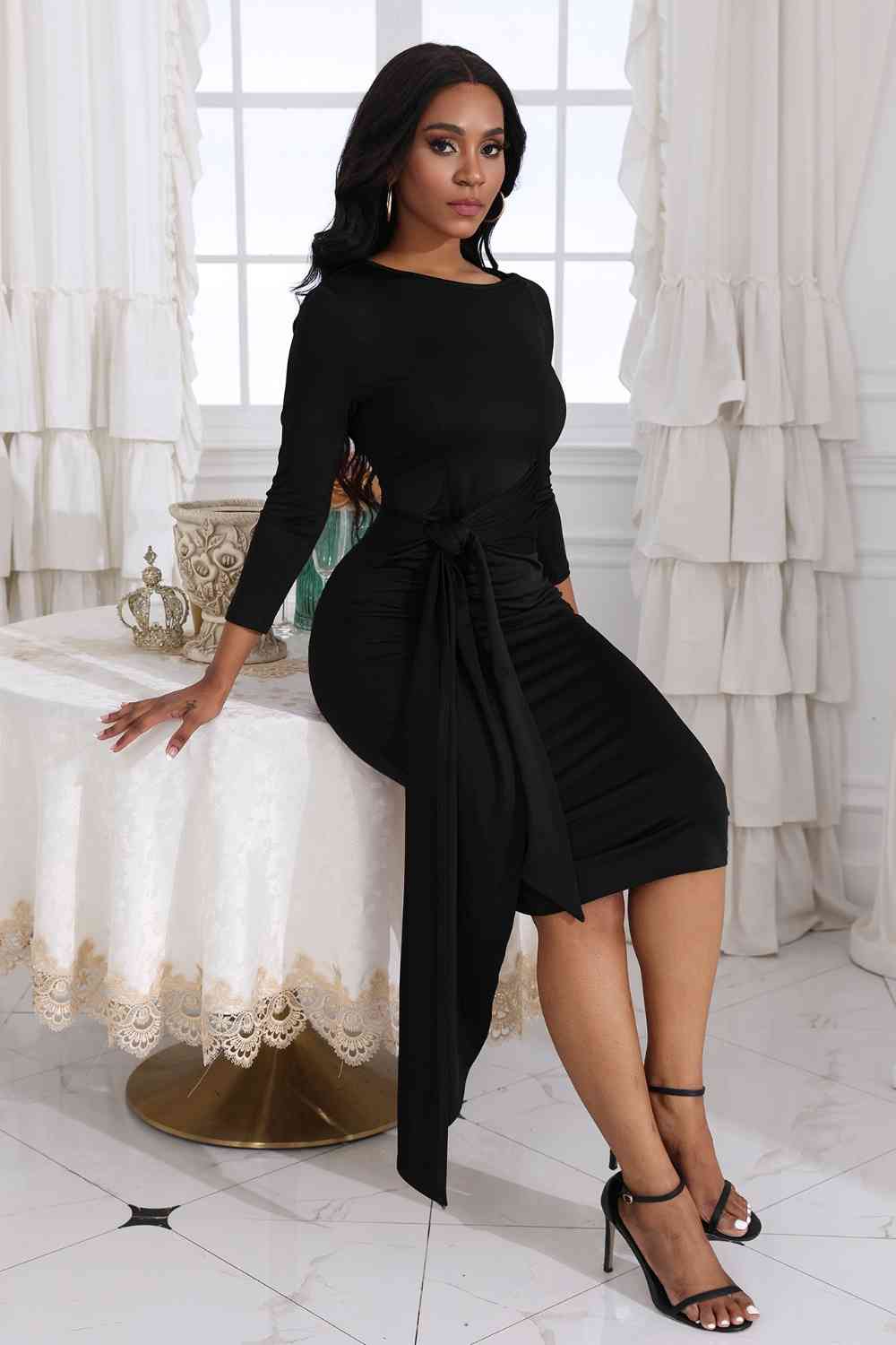 Tie Detail Round Neck Midi Dress - Embrace elegance with this chic and highly stretchy dress. The tied detail adds a sophisticated touch, making it perfect for various occasions. Made from 80% polyester and 20% spandex, the dress is both comfortable and stylish.