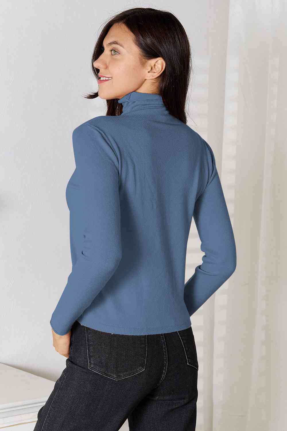 Stay cozy and stylish in our Turtleneck Long Sleeve Knit Top. Essential knitwear made from a blend of viscose and wool. Slightly stretchy for comfort. Machine washable. Available in sizes S to 2XL.