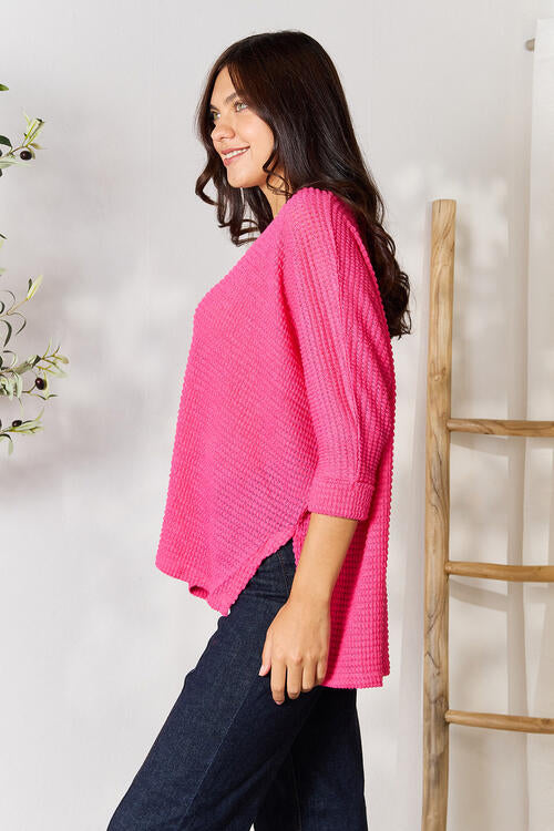 Zenana Full Size Round Neck High-Low Slit Knit Top. Made from a blend of polyester, rayon, and spandex. Highly stretchy for all-day comfort. Available in various sizes.