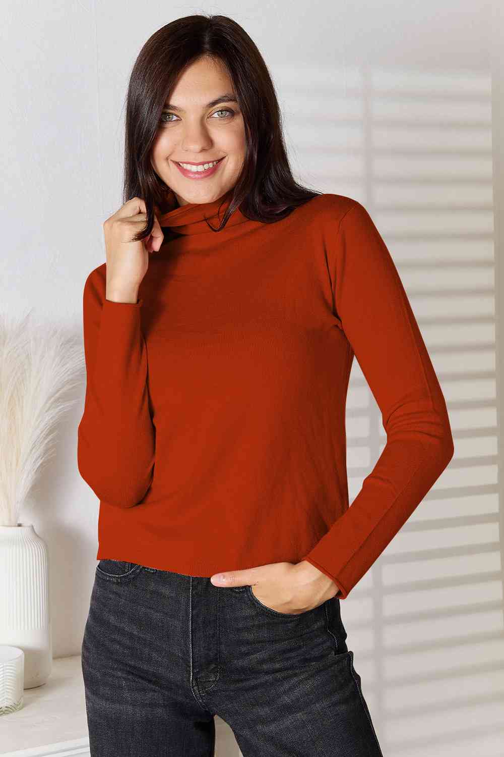 Stay cozy and stylish in our Turtleneck Long Sleeve Knit Top. Essential knitwear made from a blend of viscose and wool. Slightly stretchy for comfort. Machine washable. Available in sizes S to 2XL.